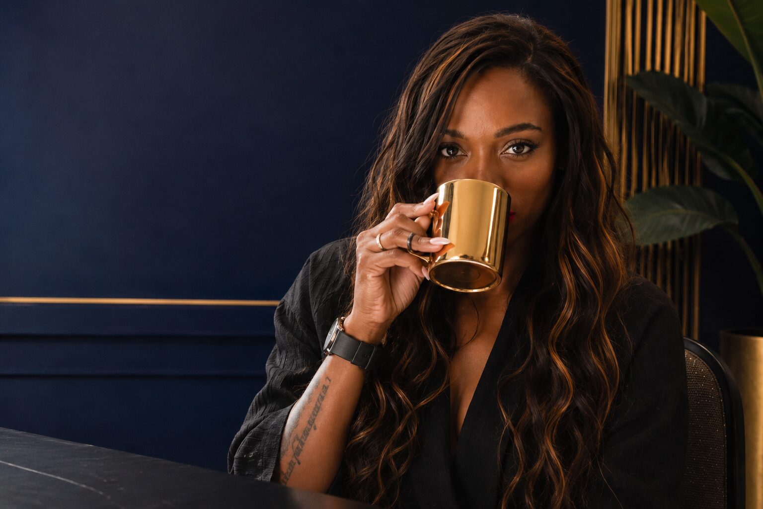 Melanie Martin enjoying coffee while helping businesses achieve sales and revenue growth through genuine relationships and commercial strategy.