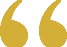 Golden quote marks on black background